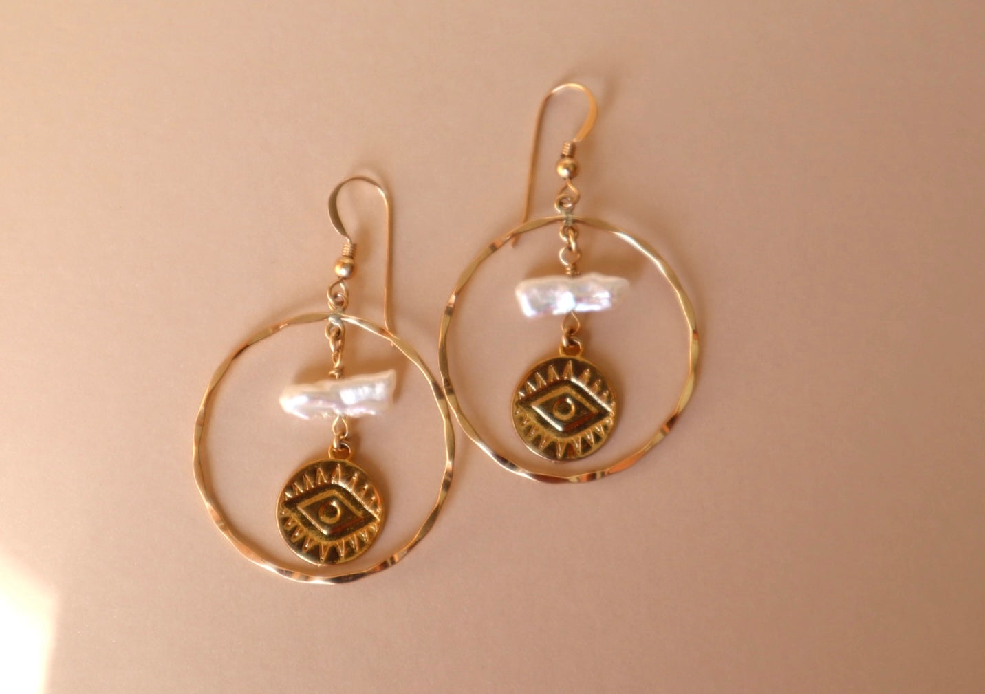 Gold-filled protective talisman hoop earrings — Raksha earrings by Hera Jewels.