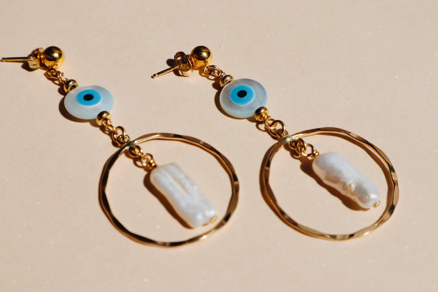 Gold-filled evil eye protective earrings — Soteria earrings by Hera Jewels.