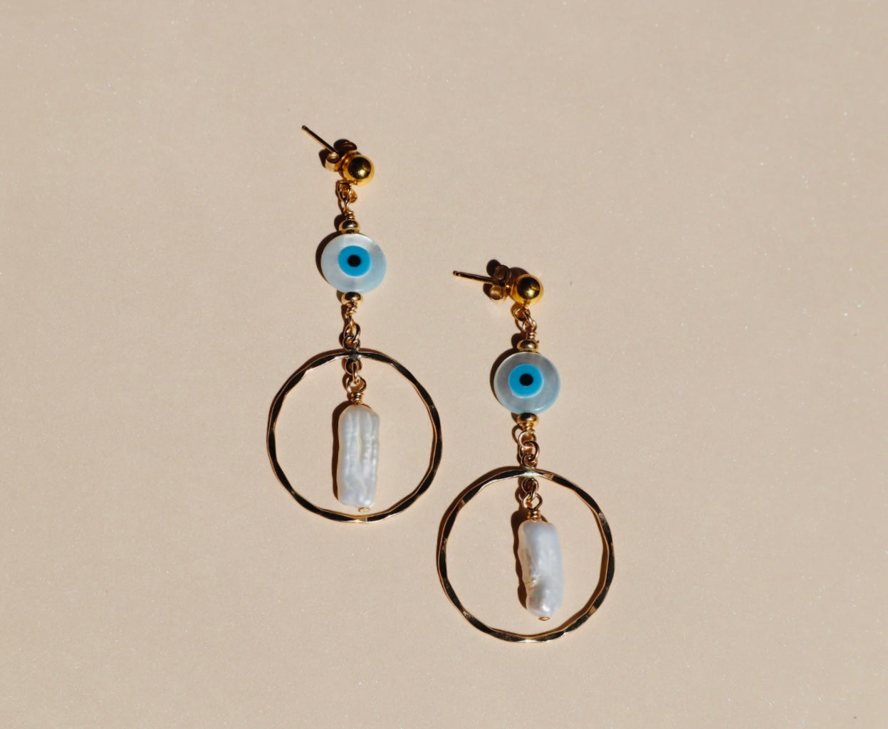Gold-filled evil eye protective earrings — Soteria earrings by Hera Jewels.