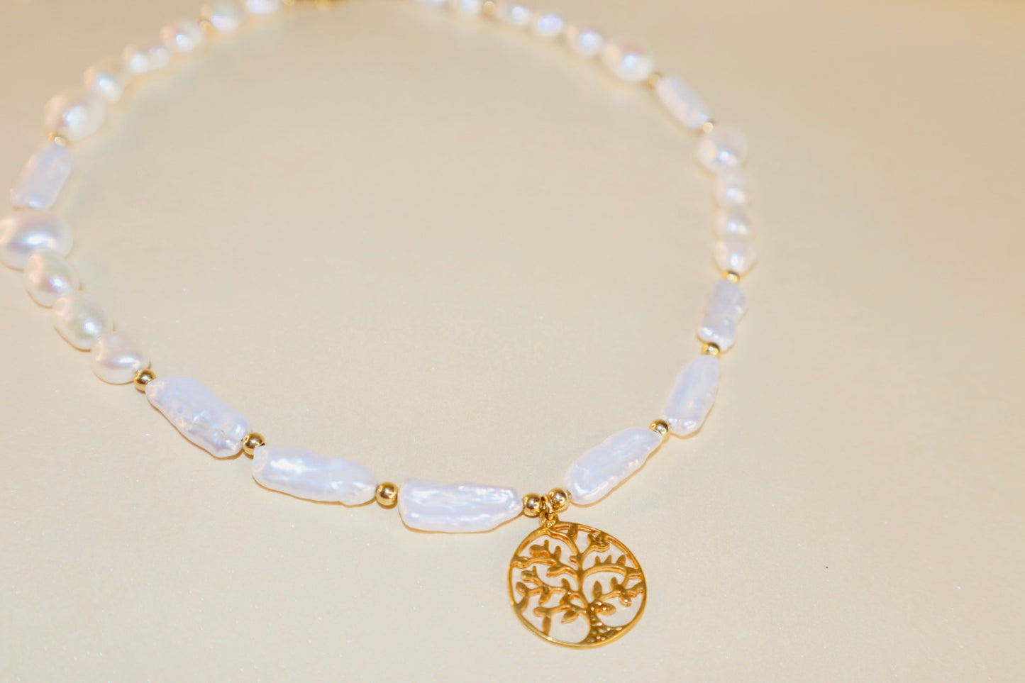 Gold Tree of Life pendant with freshwater pearl on gold chain — Athena necklace by Hera Jewels.