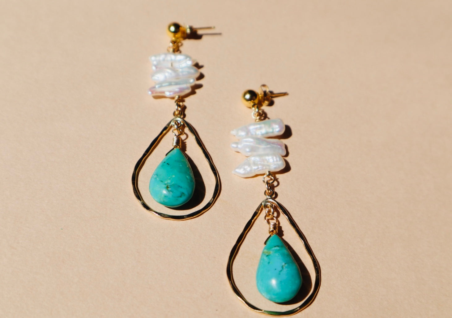 Freshwater pearl, turquoise, and hammered gold chandelier earrings — Hathor earrings by Hera Jewels.