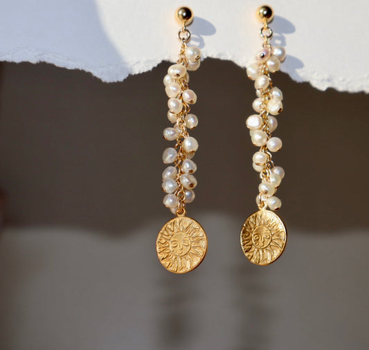 Handwoven pearl and gold sun-inspired earrings – Soleil earrings by Hera Jewels.