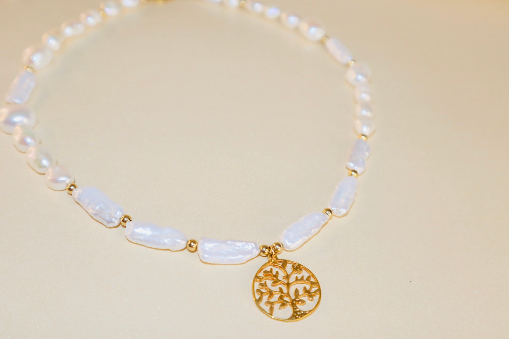 Gold Tree of Life pendant with freshwater pearl on gold chain — Athena necklace by Hera Jewels.